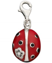 Add a touch of lady luck to your necklace or bracelet. This black and red ladybug charm is set in sterling silver with sparkling cubic zirconia accents. Lobster claw clasp. Approximate drop: 1/3 inch.