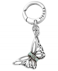 Flight of fancy. Fossil's breezy butterfly charm features a delicate openwork design with reconstituted turquoise accents. Set in silver tone mixed metal. Approximate drop: 1 inch.