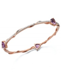 A slim row of sparkle makes a big impact. Victoria Townsend's pretty bangle bracelet slips over the wrist and shines in trilliant-cut amethyst (7-1/2 ct. t.w.) with diamond accents. Set in 18k gold over sterling silver. Approximate length: 8 inches. Approximate diameter: 2-1/2 inches.