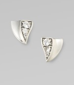 From the Thorn Collection. Triangular, thorn-shaped studs of gleaming sterling silver, with a concave profile on one side and sparkling white sapphires on the other.White sapphireSterling silverLength, about ½Post backImported