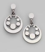 From the Dot Collection. This striking design of sterling silver circles is at once modern and classic.Sterling silver Length, about 1½ Width, about 1 Post and nut back Imported