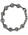 Black is beautiful in this link bracelet from 2028. Crafted from hematite-tone mixed metal, the bracelet stuns with dark stones for a bold statement. Approximate length: 7 inches + 1-1/2-inch extender.