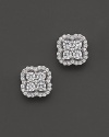 Diamond clover earrings in white gold.