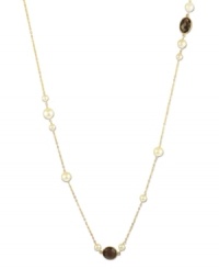 Long and luxurious. This beautiful 42-inch necklace combines petite stations of cultured freshwater pearl (6-8 mm) and onyx (15-3/8 ct. t.w.). Delicate chain and setting crafted in 18k gold over sterling silver. Approximate length: 42 inches.