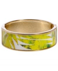 Channel the exoticism and energy of Brasil in Haskell's inspired skinny bangle. The Palm bangle features a yellow and green palm leaf print design, set in gold tone mixed metal with a hinge clasp. Approximate diameter: 2-1/2 inches. Approximate length: 8 inches. Item comes packaged in a green gift box.