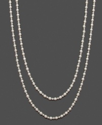 Polish and shine for miles! This long, cultured freshwater pearl (5-6 mm and 7-8 mm) strand necklace provides an elegant, layered look that's both timeless and unique. Approximate length: 64 inches.