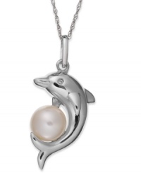 Fun and fashion-forward, this dolphin pendant features a cultured freshwater pearl (8-1/2-9 mm) and diamond accents for a stunning look. Crafted from sterling silver. Approximate length: 18 inches. Approximate drop: 1-1/4 inches.