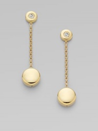 A luminous diamond and 18k yellow gold circle are connected by a delicate chain.Diamond, 0.10 tcw 18k yellow gold Drop length, about 1½ Post backs Imported