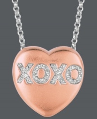 Say it from the heart. Sweethearts' adorable heart-shaped pendant expresses more that just great style with the letters XOXO written in round-cut diamonds (1/10 ct. t.w.) across the surface. Pendant crafted in 14k rose gold over sterling silver and sterling silver. Copyright © 2011 New England Confectionery Company. Approximate length: 16 inches + 2-inch extender. Approximate drop: 5/8 inch.