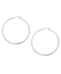 Don't mess with perfection. These traditional hoop earrings from Kenneth Cole New York are crafted in silver tone mixed metal with a click-top closure. Approximate diameter: 2 inches.