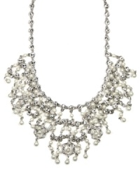 All eyes on you. Givenchy's dramatically-glamorous bridal necklace features a sweet mix of glass pearls and accents that will unfold delicately at your neckline. Crafted in silver tone mixed metal. Approximate length: 16 inches. Approximate drop: 3 inches.