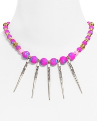 Equal parts punk and pretty, this Vanessa Mooney statement necklace flaunts edged up style with bold colored beads and plated silver spikes.