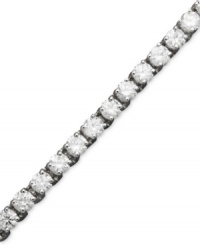 Diamond decadence. She will love you forever when she opens this gift. Tennis bracelet features a sparkling row of round-cut diamond (8 ct. t.w.) crafted in 14k white gold. Approximate length: 7 inches.