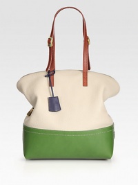 Stash your essentials in this colorblocked silhouette of pebble grain and matte leather.Adjustable double shoulder straps, 9¼-10½ dropTop zip closureTwo inside open pocketsCenter zip compartmentLinen lining11W X 13H X 5¼DMade in Italy