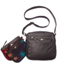 Easygoing and outfitted for adventure, this travel-ready crossbody from Tyler Rodan is the perfect companion. With a sturdy adjustable strap, plenty of pockets and secure zip-top closure, it includes 2 complementary zip pouches for extra convenience.