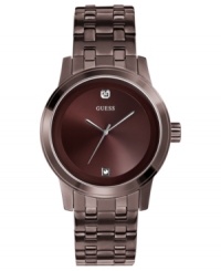 Diamond accents stand out on this polished steel watch from GUESS.