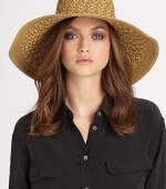 This dramatic, packable straw topper features signature logo rivets, elasticized inner band and an oversized, sloped brim for maximum sun protection and style.Brim, about 4.75Elasticized inner band fits most95% UVA/UVB protectionPolypropylene/polyesterSpot cleanImported and hand-finished in the USA