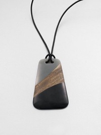 A leather cord and stunning, art-deco inspired pendant made from a brilliant combination of wood and resin.Leather cordLength, about 23Pendant size, about 4Pull-stringImported