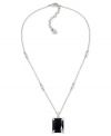 A singular statement. Carolee brings fashion to the forefront in its new pendant, crafted from silver-tone mixed metal and featuring a black glass stone at the center. Approximate adjustable length: 16 inches + 2-inch extender. Approximate drop: 1 inch.