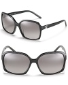 Lounge pool-side in these chic oversized square sunglasses from Fendi.