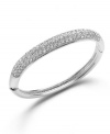 Sparkling, stackable style! Pair this party-perfect bangle with others for a chic, layered look, or wear it alone to make a solitary statement. Charter Club's stylish bangle creates the perfect amount of shine with glittering, pave-set glass accents. Crafted in silver tone mixed metal. Approximate diameter: 2-1/4 inches.