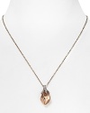 A coolly plated claw grabs for a faceted rose gold stone on this House of Harlow 1960 necklace, finished in a simply styled palladium plated chain.