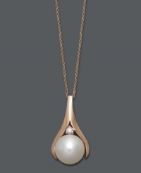 A timeless look that's simple and sophisticated. A traditional cultured freshwater pearl (9-1/2-10 mm) and round-cut diamond accent take on a slightly modern touch with the addition of a 14k rose gold setting. Approximate length: 18 inches. Approximate drop: 3/4 inch.