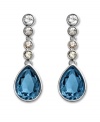 True blue: Made in silver tone mixed metal, Swarovski's Meringue Montana crystal and rhinestone earrings are an elegant finishing touch for your wardrobe. Approximate drop: 1-3/8 inches.