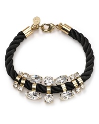 Crystal stones dress up a twisted cord on this bracelet from nOir. Equal parts crafty and cool, it instantly adds summer-perfect sparkle to your arm army.