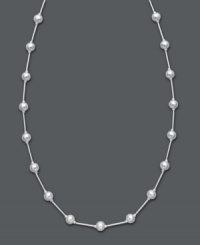 A simple layer that adds polish and shine. Giani Bernini's station necklace features shiny beads strung from a delicate chain. Crafted in sterling silver. Approximate length: 16 inches + 3-inch extender.