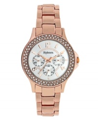 Look on the bright side. Rosy watch by Style&co. crafted of rose-gold-plated mixed metal bracelet and round case. Bezel embellished with crystal accents. Mother-of-pearl dial features applied rose-gold tone numerals at twelve, four and eight o'clock, stick indices,