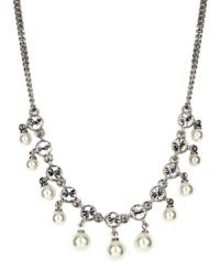 Introduce yourself to something dazzling. Givenchy's elegant frontal necklace features a sparkling mix of glass pearls and accents, all in a prettily-packaged drop design. Approximate length: 16 inches + 2-inch extender.