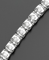 A striking statement with a twinkle. Round-cut diamonds (1 ct. t.w.) and 14k white gold create a unique and elegant diamond bracelet. Length measures 7-1/4 inches.