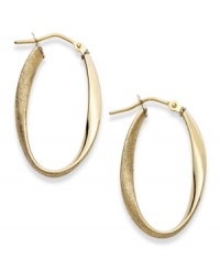 The perfect mix of texture and polish, these 14k gold hoop earrings feature a twisted design and chic, oval shape. Earrings secure with a lever backing. Approximate diameter: 1-1/6 inch.