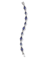 Ever-glamorous pavé crystals frame stunning sapphire stones on this modern Lora Paolo bracelet.