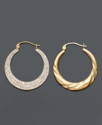 These hoop earrings perform double duty. One side showcases thick, molded 14k gold; the other glimmers with round-cut crystal accents. Approximate diameter: 1-1/10 inches.