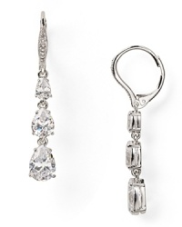 These Nadri triple earrings recall delicate sparkling droplets with a cascade of cubic zirconia crystals, finished by a rhodium plated leverback closure.