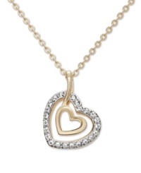 Take the classic heart pendant to a whole new level with Swarovski's chic, double heart design. Two open-cut hearts and chain crafted in gold tone mixed metal with sparkling crystal accents. Approximate length: 15 inches. Approximate drop: 1-1/4 inches.