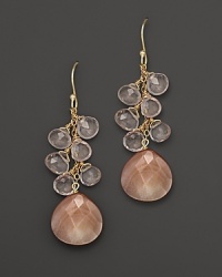 Sheer, faceted rose quartz teardrops dangle around a faceted pink shell ornament. Set in 14K yellow gold.