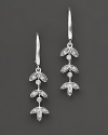 A naturally beautiful look, diamond leaf drop earrings in white gold.