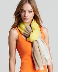 Echo's woven scarf captures this season's color block craze. Use it to boost the mood of monochromatic and basic black ensembles.