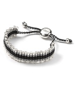 This unique sterling silver hand-woven lanyard with staggered links is a modern, grown-up take in the friendship band.