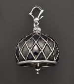 Inspired by Zen philosophy, this intricately detailed, blackened and polished sterling silver meditation bell from Paul Morelli jingles softly.