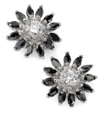 Pull out all the stops with sparkling flower studs in vintage style. City by City earrings feature glistening, jet black cubic zirconia petals with a clear cubic zirconia center (5-1/4 ct. t.w.). Crafted in silver tone mixed metal.