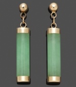 Whether for an elegant evening affair or to add simple color to a casual outfit, these polished green drops are the perfect finishing touch. Solid jade cylinders (4 mm x 15 mm) add subtle color in a 14k gold post setting. Approximate drop: 1/2 inch.