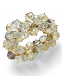 Clusters of captivating ornaments for the season! Slip on c.A.K.e. by Ali Khan's stretchable bracelet, with enchanting opal color glass beads. Crafted in gold tone mixed metal. Approximate diameter: 2-1/4 inches.