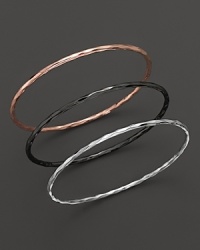 A trio of glimmering bangles in sterling silver, rose and yellow gold makes the perfect gift set. From Ippolita.