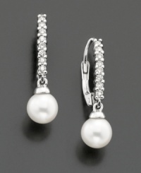 Simply elegant with ladylike touches. Earrings by Belle de Mer feature cultured freshwater pearl drops (8-9 mm) and sparkling, round-cut diamonds (1/4 ct. t.w.) in 14k white gold setting. Approximate Drop: 1/2 inch.