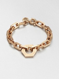 A logo accented nut charm sits on a narrow, chain link design. Rose goldtone brassLength, about 7.6Charm size, about .75Spring ring closureImported 