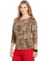 A slimming faux wrap design elegantly defines Calvin Klein's three-quarter-sleeve plus size top, finished by an animal-print.